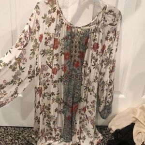 Long sleeve flowy dress with flower detailing